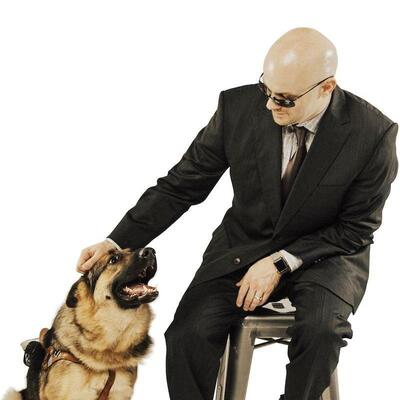 Chad E. Foster with a dog